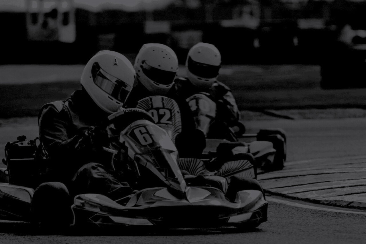 Three karting racers on track